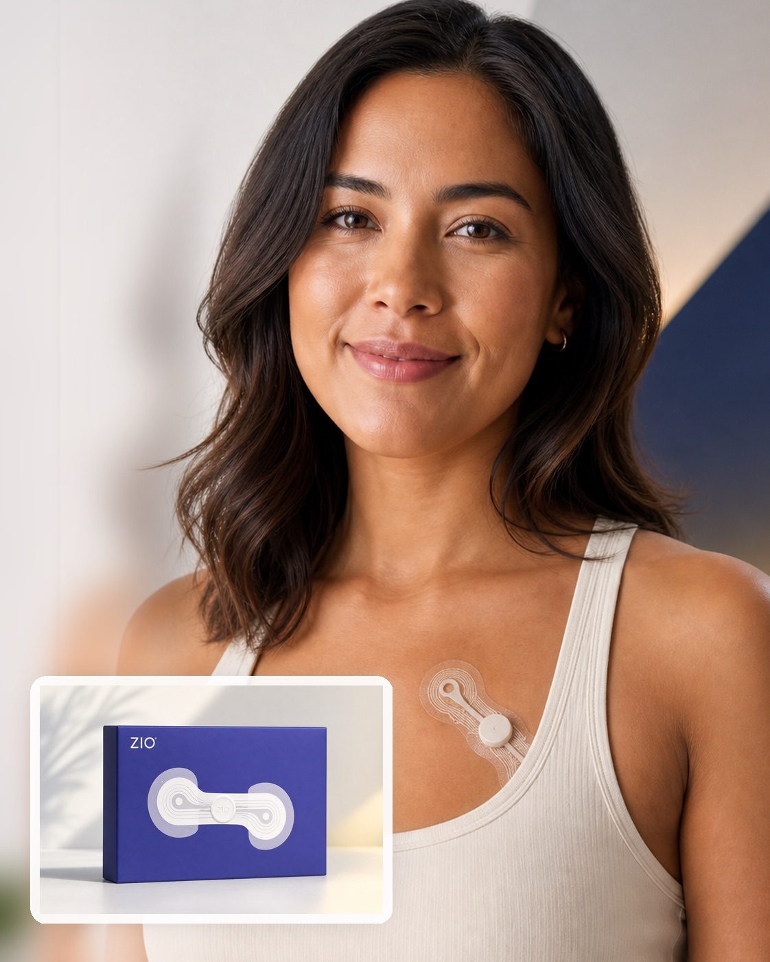Person wearing a Zio heart monitor with product box